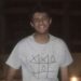 Ahmed smiles at the camera