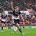Josh Coburn celebrates after scoring against Stoke City. Image: Millwall FC