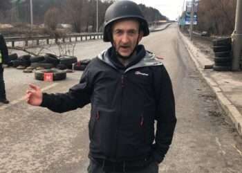 Freeman reporting beside anti-tank landmines in Ukraine. Credit: Colin Freeman.