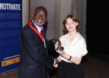 Councillor Sunny Lambe presenting award to Evie