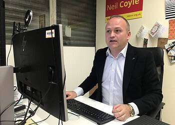 Neil Coyle in his constituency office
