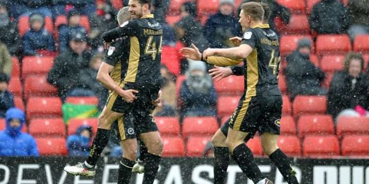 Ben Marshall celebrates his spectacular strike in the 2-0 win at Barnsley in March 2018. Image: Millwall FC