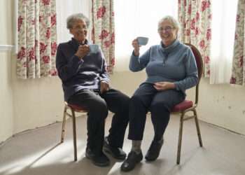 Group members Rosemary and Margaret enjoying tea at ‘Warm Spaces’. Credit: Link Age Southwark.
