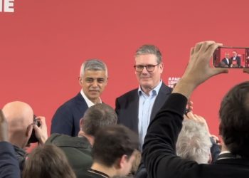 Sir Keir Starmer and Sadiq Khan pose for pictures. 
Credit: Noah Vickers