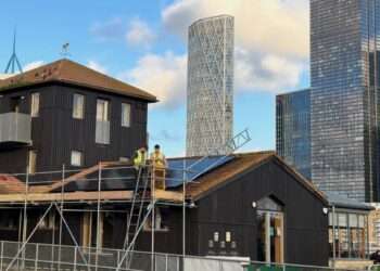 SOLAR PANELS being installed at Surrey Docks Farm, funded through Southwark Community Energy Fund and financed through Southwark Green Investment 3. Photo Credits: Southwark Council.