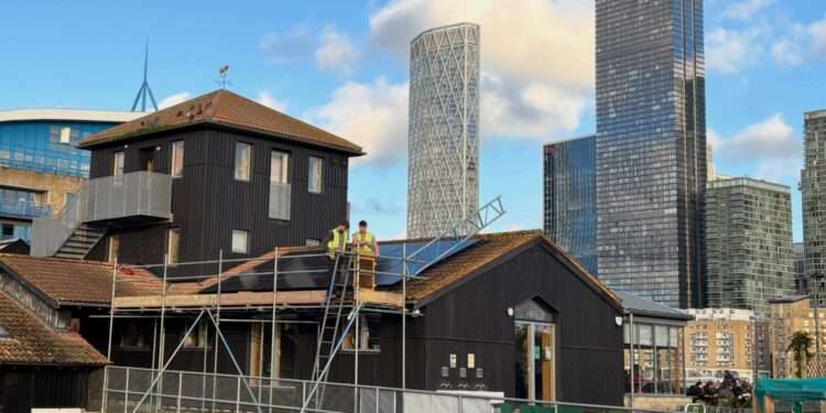 SOLAR PANELS being installed at Surrey Docks Farm, funded through Southwark Community Energy Fund and financed through Southwark Green Investment 3. Photo Credits: Southwark Council.