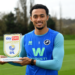 Femi Azeez holding the player of the month award.  Image: EFL