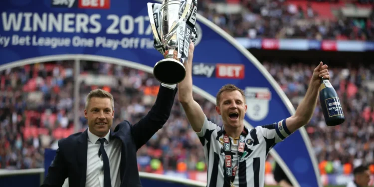 Tony Craig and Neil Harris after the 2017 play-off final. Image: Millwall FC
